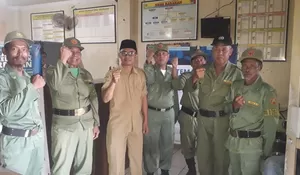 Linmas Babakan Siaga Kawal TPS