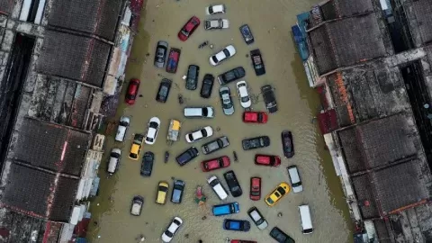 Banjir besar yang malanda Malaysia menelan korban jiwa. FOTO: Antara 