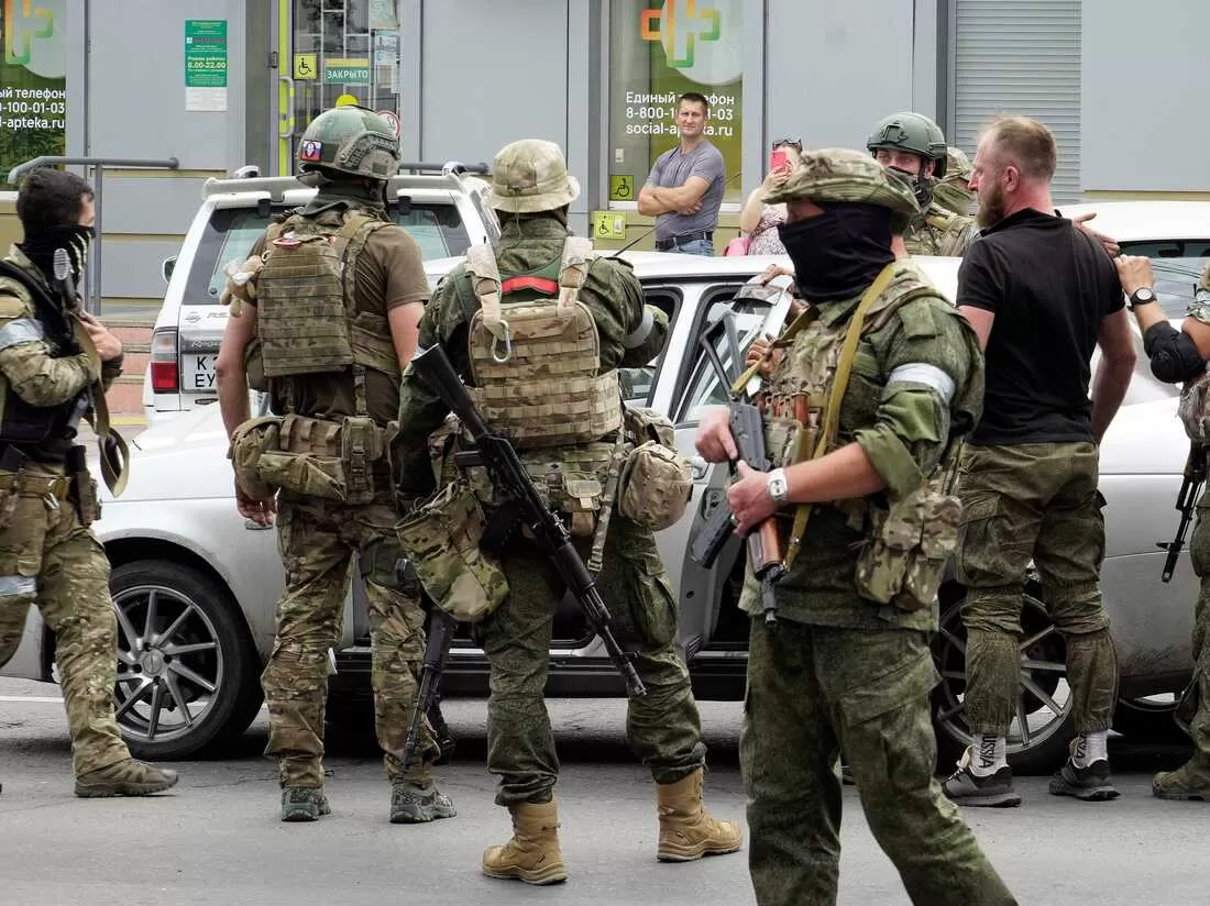 Members of Wagner group inspect a car in a street of Rostov-on-Don, on June 24, 2023. President Vladimir Putin on June 24, 2023 said an armed mutiny by Wagner mercenaries was a "stab in the back" and that the group's chief Yevgeny Prigozhin had betrayed Russia, as he vowed to punish the dissidents. Prigozhin said his fighters control key military sites in the southern city of Rostov-on-Don. (Photo by STRINGER / AFP) (Photo by STRINGER/AFP via Getty Images) (STRINGER)