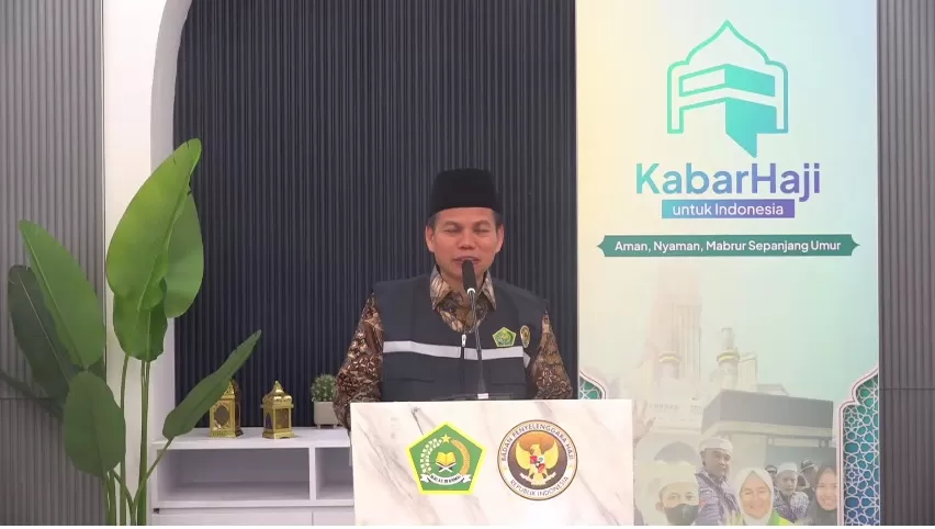 Direktur Pelayanan Haji Dalam Negeri Kemenag, Muhammad Zain, dalam konferensi pers yang disiarkan melalui kanal YouTube Kemenag. (Youtube/KemenagRI)