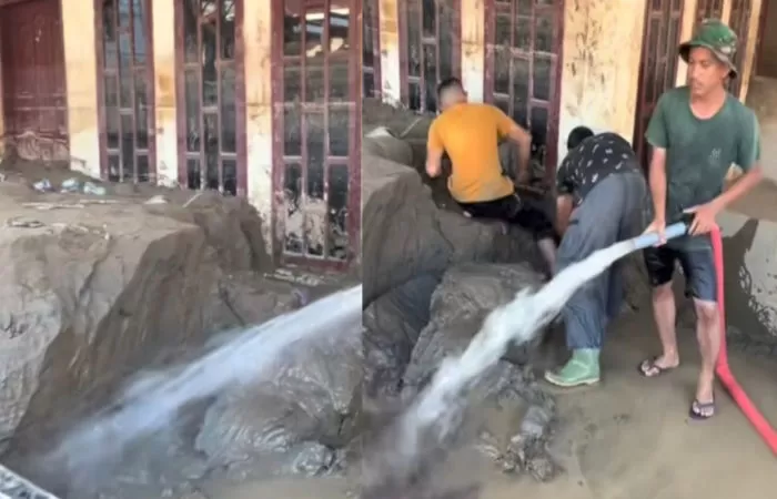 Warga Pidie Jaya berjibaku membersihkan lumpur tebal sisa banjir bandang (Foto: TikTok/@Mawa)