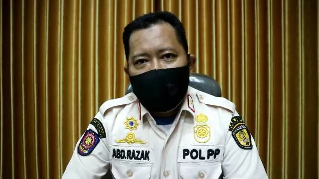 MENGUNDURKAN DIRI: Kepala Satuan Polisi Pamong Praja dan Damkar HST, Abdul Razak, mengundurkan diri dari jabatannya setelah 128 anggota Pol PP dirumahkan. | foto: Istimewa)
