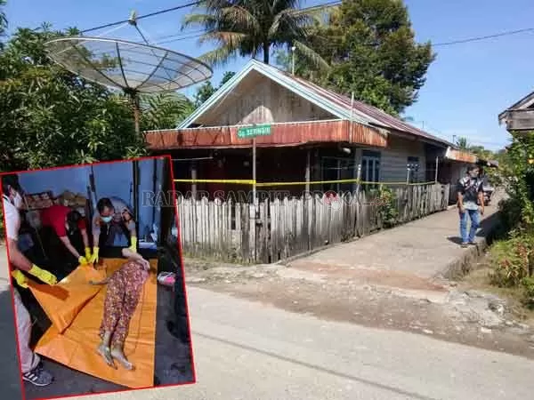 JENAZAH: Jenazah korban dievakuasi  petugas menggunakan mobil ambulance dari rumah korban di Gang Beringin, Sampit, Jumat (30/10).(HENY/RADAR SAMPIT )