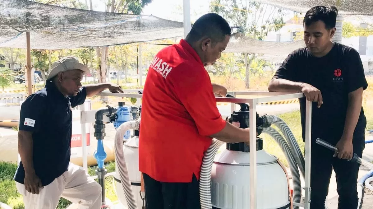PMI Jember saat memberikan edukasi tentang klorinasi (Dok. PMI Jember)