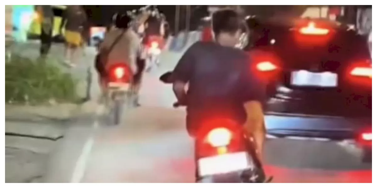 Pengendara motor tanpa helm dan oleng di Jalan Timor Raya Kupang karena diduga mabuk demi mencegah kecelakaan lalu lintas malam. (Foto TBN Polresta Kupang Kota)