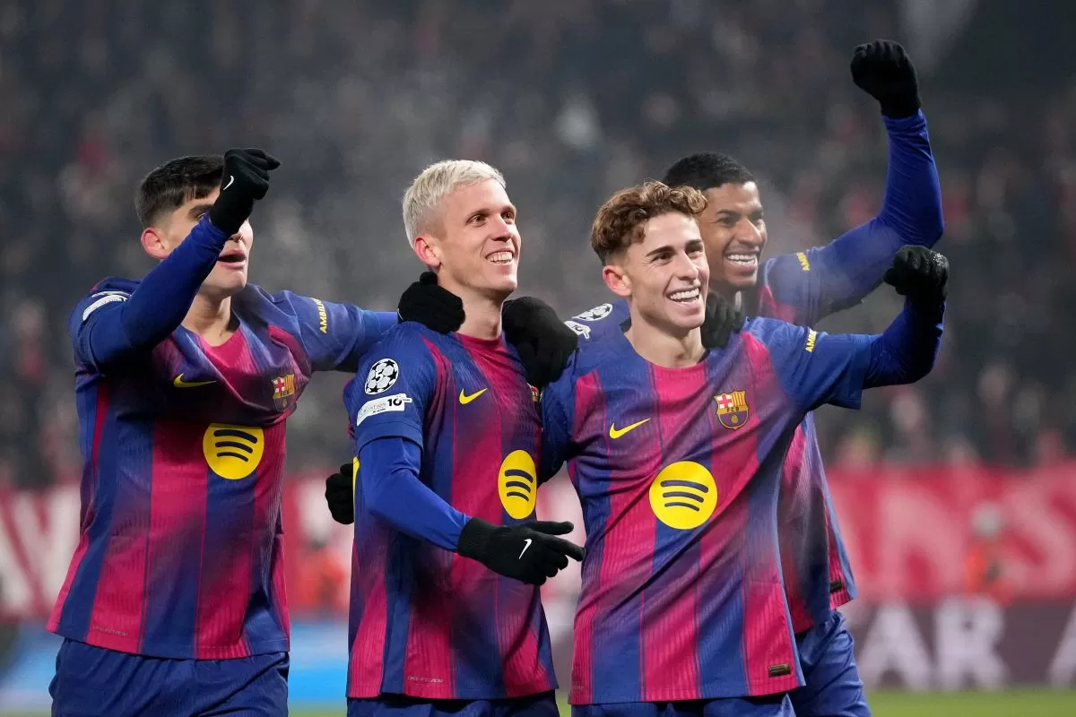 Barcelona merayakan kemenangan tandang Liga Champions.