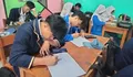 Rangkuman Menilai Karya Melalui Resensi Kelas 11 Materi Bahasa Indonesia Semester 2