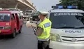 Satlantas Jakarta Utara Beri Himbauan Lalu Lintas di Lampu Merah Tanah Merdeka