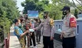 Polres Kepulauan Seribu beserta Jajaran Bagikan 1.500 Masker Medis Ke Warga