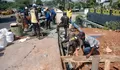 DPUPR Depok Perbaiki Jalan Amblas di Kalibaru