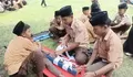 Edukasi Lewat Simulasi Nyata, PMI Jember Tanamkan Kesiapsiagaan Bencana pada Pelajar MTs Miftahul Ulum Gumukmas