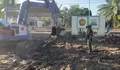 Gotong Royong dengan Masyarakat di Aceh, TNI Bersihkan Rumah Warga hingga Sekolah dari Lumpur