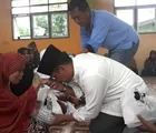 Warga Rumbai Pesisir Senang Dapat Daging Qurban