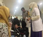 Bhabinkamtibmas Sidomulyo Timur Bantu Korban Penderita Hidrosefalus