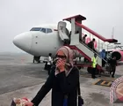 Arus Mudik di Bandara SSK II Terganggu Kabut Asap