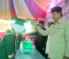 Hadiri Haflah Al-Tasyakur Anwarul Ulum, Bupati Inhil: Lanjutkanlah Pendidikan