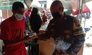 Ciptakan Pasar Sehat, Polsek Brangsong Bagi-bagi Masker di Pasar Sidorejo 