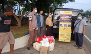 100 Paket Takjil Yayasan KLIMIS Habis Diserbu Warga