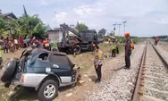 Sebuah Mobil Tertabrak Kereta Api Menewaskan 2 Orang Penumpang