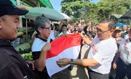 Semangat Merah Putih Berkibar di Kabupaten Bogor: Iwan Setiawan Bagikan Bendera Kepada Warga