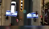 Gelar Aksi Bela Palestina, Bendera Israel Berukuran Besar Dilindas Kendaraan di Jalan Raya Parung-Bogor