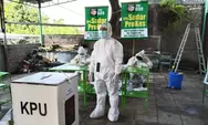 Sadar Prokes, Petugas KPPS Solo Kenakan Baju Hazmat