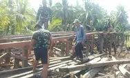 Satgas TMMD Pasang Gelagar Jembatan Handil Samsu