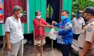 Bagikan 2 Ton Ikan Segar Kepada 1000 KK
