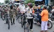 Satpol PP Sumut dan Polantas Medan Tertibkan Kerumunan Pesepeda