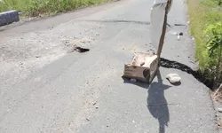 Hujan Deras Rusak Jalan Provinsi di Lore Timur