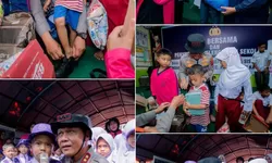 Aksi Kemanusiaan yang Menggetarkan Hati: Saat Kapolda Sumbar Bersimpuh Memasangkan Sepatu untuk Anak Yatim Korban Banjir Bandang