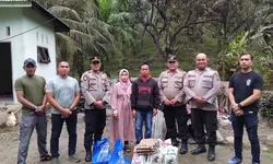 Polsek Salapian Salurkan Bantuan Sosial kepada Korban Kebakaran Rumah di Lau Tepu