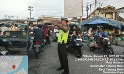 Sat Lantas Polres Tanjung Balai Gelar Gatur Pagi di Titik Rawan