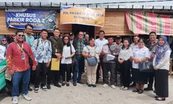 PD Pasar Horas Jaya Pematangsiantar menggunakan aplikasi pembayaran non tunai berbasis QRIS.