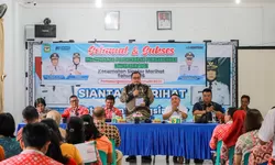 Wako Pematangsiantar diwakili Asisten Administrasi Umum membuka Musrenbang Kec.Siantar Marihat.