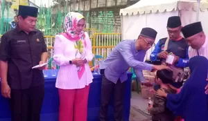 Pasar Malam Perdana Ria Berbagi Bersama Anak Yatim Piatu di Lapangan Sakura