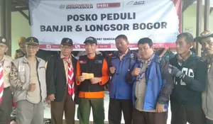 Pramuka Bogor Barat Distribusikan Bantuan ke Sukajaya