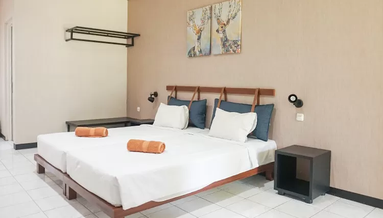 Selengkapnya tentang harga dan fasilitas penginapan tipe Deluxe Room di destinasi wisata INAGRO