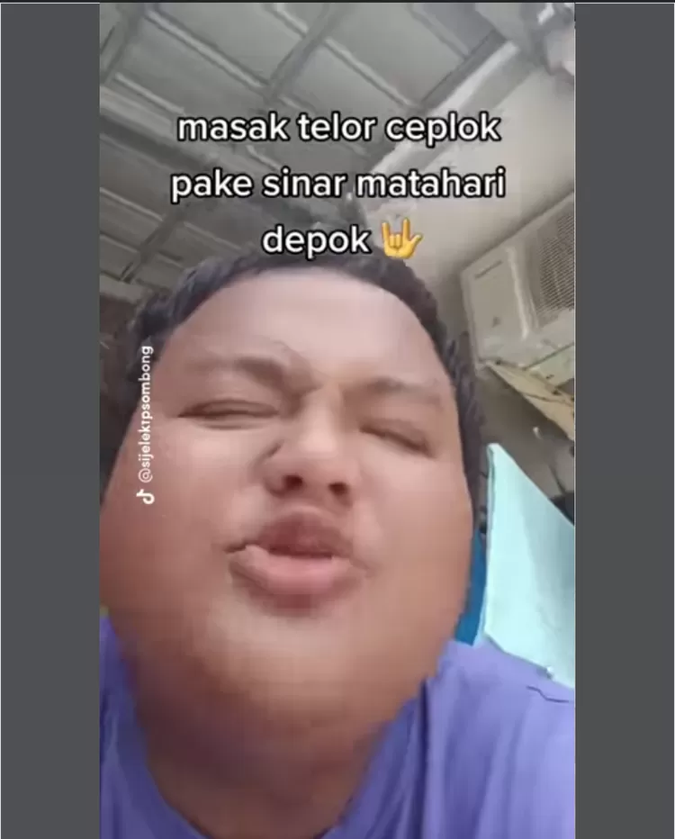 sosok sang pemuda yang mencoba eksperimen masak telur menggunakan sinar matahari Depok