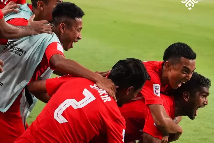 para pemain Singapura merayakan gol setelah membobol gawang Filipina pada pertandingan grup A piala AFF Suzuki Cup 2020 (Instagram @affsuzukicup )
