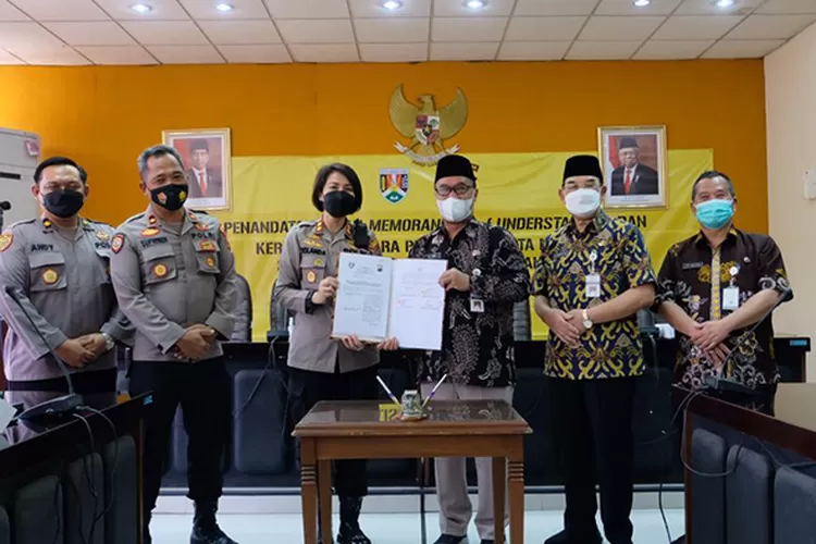 Pemkot Magelang dan Polres Magelang Kota menandatangani Mou bidang pembangunan dan pelayanan masyarakat.  (Foto : dok.Pemkot Magelang)