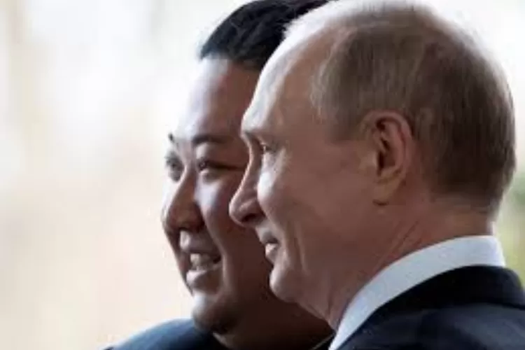 Vladimir Putin dan Kim Jong Un  (Reuters )