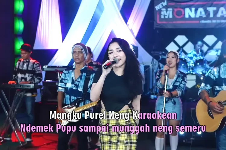 Lirik lagu 'Mangku Purel' oleh Lala Widy, beserta terjemahan Bahasa Indonesia. (Tangkap Layar Youtube / Perdana Record)