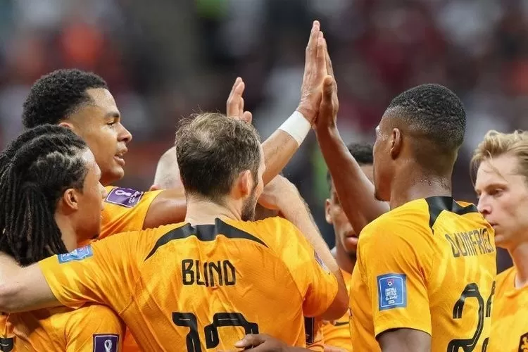 Timnas Belanda merayakan gol yang dicetak ke gawang Amerika Serikat.