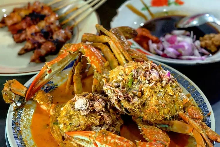 Rajungan Gulai Khas Nusantara Dengan Kuah Santan Kental Kaya Rempah, Cocok Dinikmati Bersama Nasi Hangat.