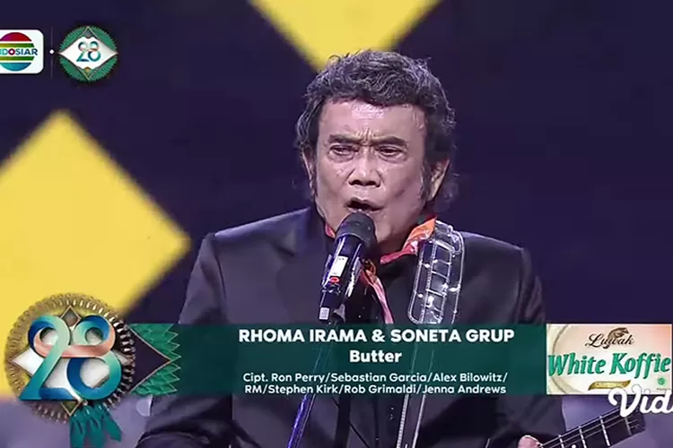 Tangkapan layar Rhoma Irama menyanyikan lagu Butter dari BTS di Konser Raya 28 Tahun Indosiar.  (YouTube Indosiar)