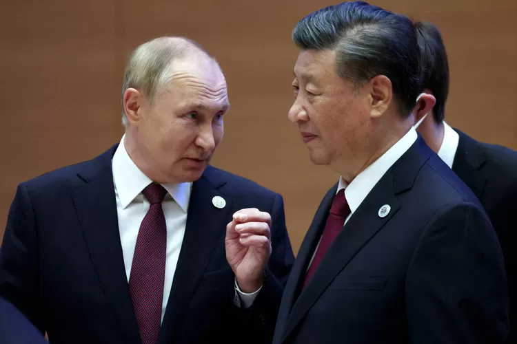 Presiden Rusia Vladimir Putin bersama dengan Presiden China Xi Jinping (SPUTNIK)