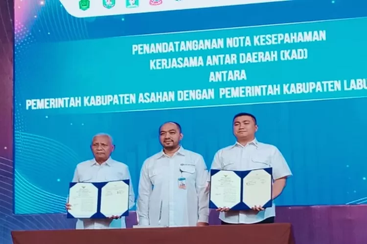 Penandatanganan KAD antara Kabupaten Asahan dengan Labura disaksikan Kepala BI P.Siantar  (Realitasonline/SS)