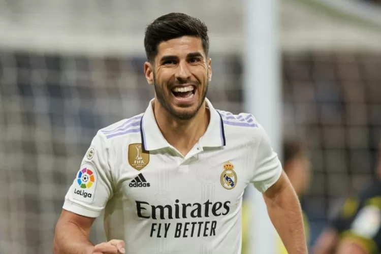 Selebrasi Asensio saat mencetak goal