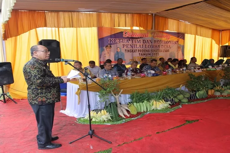 Sekda membacakan pidato Bupati Asahan pada kegiatan lomba desa dihadiri tim dari Provinsi Sumut  (Realitasonline.id/HS)